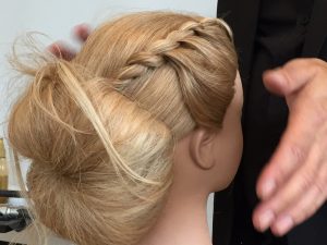 hairdressing mannequin head with braid and bun